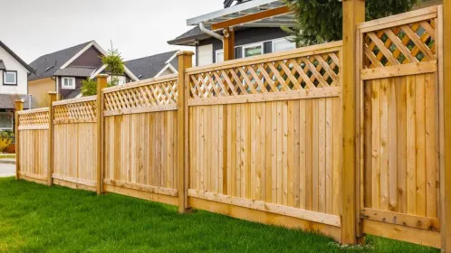 Cedar garden fence with lattice-top panels and matching gate